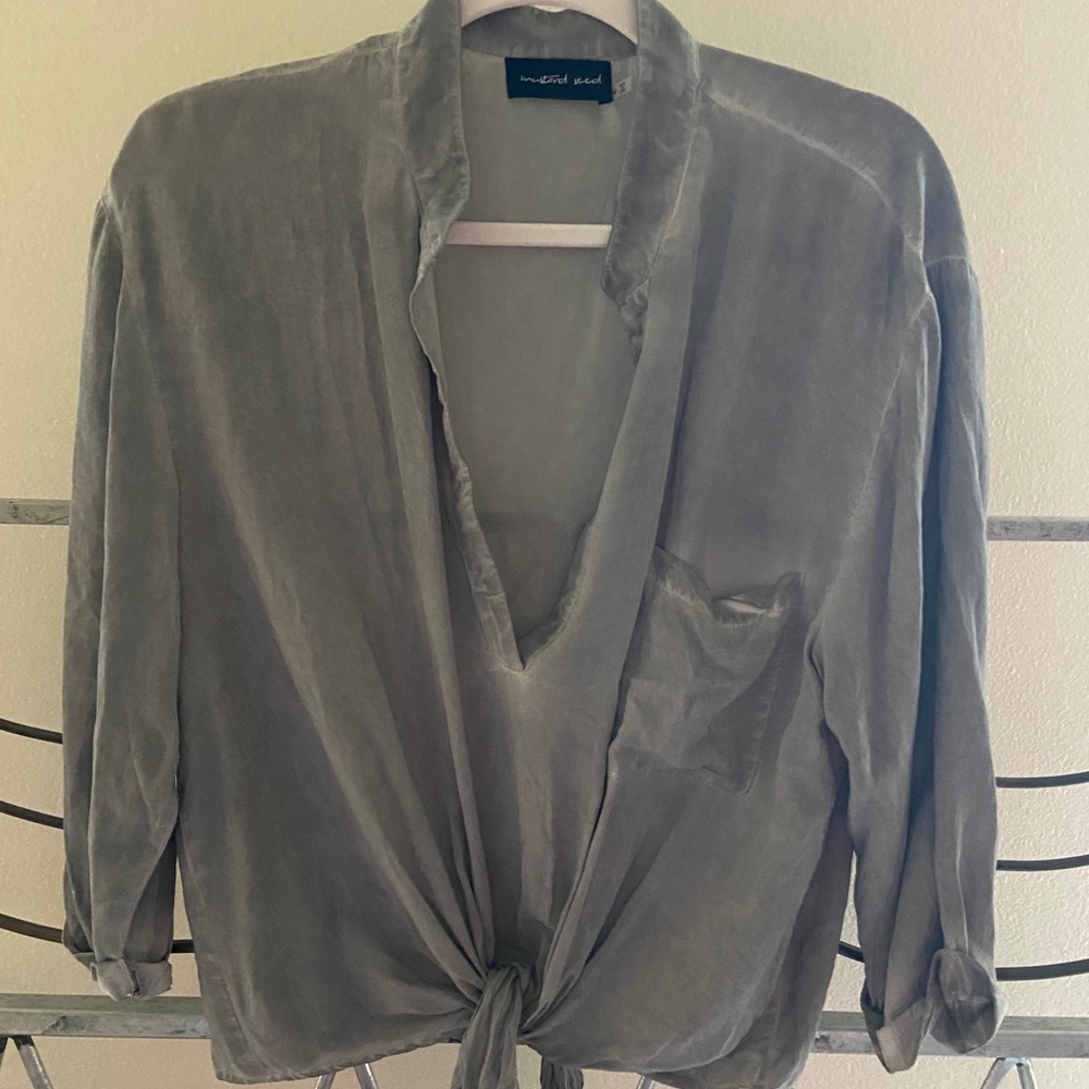 Grey loose fitting top, plunge neckline